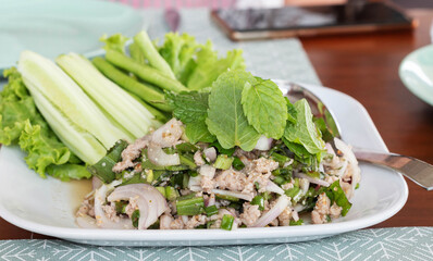 close up spicy minced pork salad with vegetable
