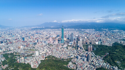 Fototapeta na wymiar Taipei City Aerial View - Asia business concept image, panoramic modern cityscape building bird’s eye view in morning blue bright sky. Drone photography shot in Taipei, Taiwan.