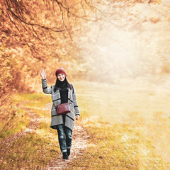 Fototapeta premium female walking in park and greeting each other while keeping social distance