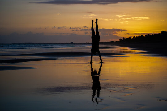 Beautiful silhouette image of Kids playing and enjoying at the Beach in Costa Rica