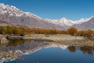 Fototapeta na wymiar Autumn season in Gupis valley in Pakistan, Hindu Gush mountain range