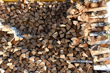Wood burning stove. Firewood for furnace heating. Warehouse for firewood for stove