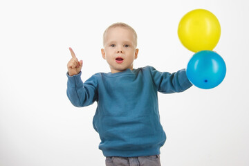 little boy child holding balloons, happy childhood