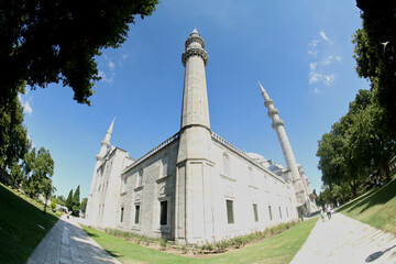 View of three minarets and the outer walls of the forecourt of the Suleymaniye Mosque in Istanbul.