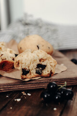 The tasty muffins with chocolate on a wooden desk. Muffins for perfect and beautiful breakfast. 