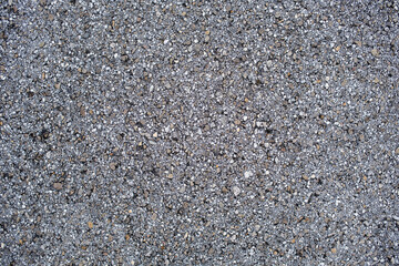 Texture of the road's gray asphalt as a background