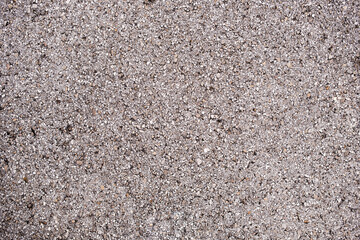 Texture of the road's gray asphalt as a background