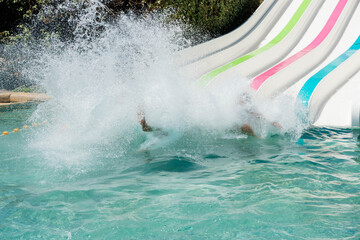 Naklejka premium children having fun in water slides