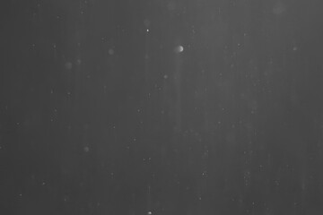 abstract background overlay white bokeh falling snow fog view on black