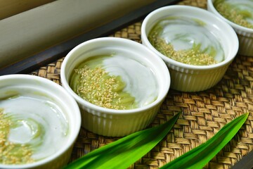 Homemade Pandanus leaf Fresh Custard on the bamboo tray - Thai Dessert