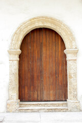 View of an old colonial arch over a patterned door