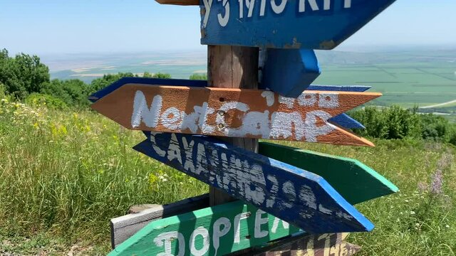 Observation deck at the top of Mashuk mountain in Pyatigorsk. Plates - pointers with the names of different cities and countries: Rybinsk, Pugachev, Dorgeli, Sakhalin, Irkutsk, Petrozavodsk, Lipetsk, 