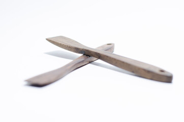 unique two tradtional wooden stir on isolated white background