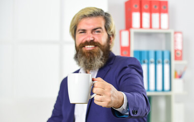 you should try this. handsome man drink morning coffee. Portrait of businessman standing in office. professional businessman waiting for partner. business man wearing smart casual clothes