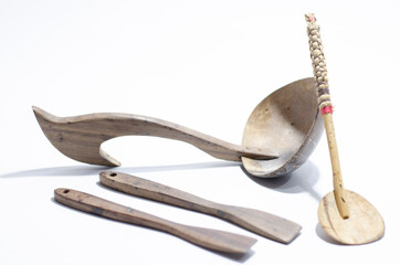 Unique Concept of Wooden Spoons and Stirs on isolated white background