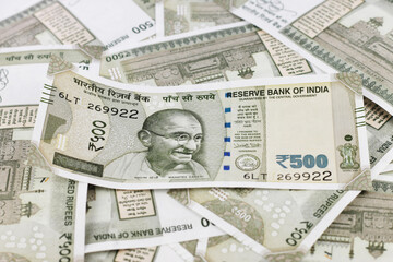 Indian currency notes of various denominations. Indian five hundred rupees note with other...