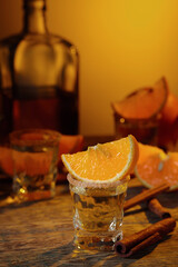Tequila with orange and cinnamon.