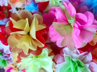 Colorful fake flowers made from mulberry paper