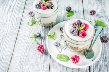 Cheesecake in portioned jars with summer berries
