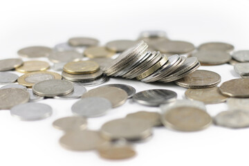 Currency coins of rupees five, rupee one, rupees two and more. Image depicting currency, expenses savings and investments.