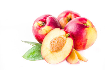 Raw peaches isolated on white