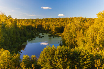 Fototapeta na wymiar Summer rural landscape with the forest, sky, forest and lake