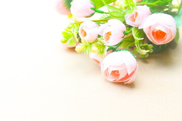 Sweet roses bouquet on brown background