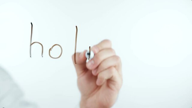 Video of man writes holiday word