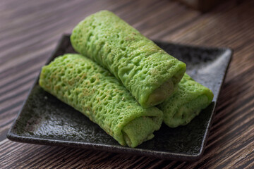 Kuih Dadar or Kuih Tayap (Malaysian Pandan Crepes with Sweet Coconut Filling)
