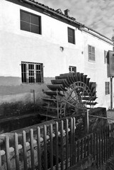 wooden wheel of an old water mill © arch.miola