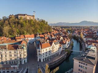 Fototapeta na wymiar Aerial drone panoramic view of Ljubljana, capital of Slovenia in warm afternoon sun.