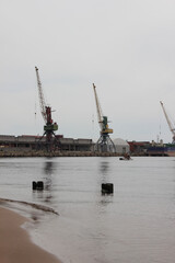 Port terminal. View at the deck cranes from ashore.