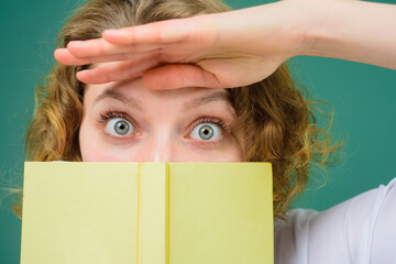 Surprised teacher with notepad. September 1. School supplies. Education. School. Job. Teacher in classroom. Close up portrait of teacher with notepad. Copy space for advertising. Back to school.