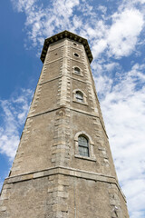 Fototapeta na wymiar Old lighthouse on the coast of Ireland. County Wicklow. 