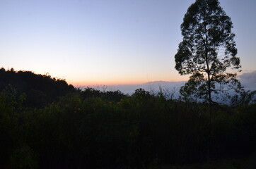 beautiful sunrise landscape in the mountain arjuna