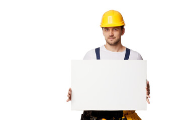 caucasian repairman worker in uniform and yellow hard hat holding empty blank board on white background