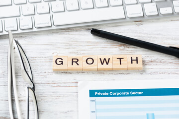 Financial growth concept with letters on cubes