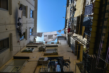 Clothes hanging outside the balconies hanging in the air