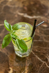Mojito cocktail served in on marble table
