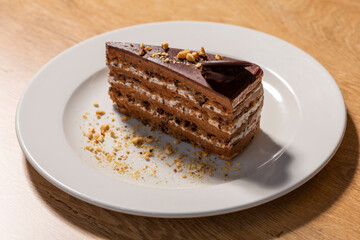 Chocolate cake served on white plate