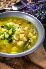 Barley soup with vegetables and chicken.
