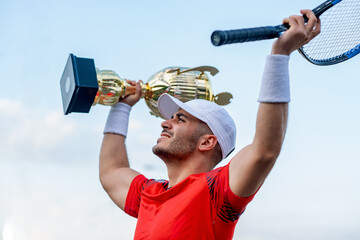 Winner on tennis court.