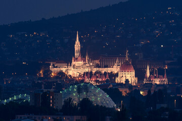 Fototapeta na wymiar Budapest night cityscape with Hungarian parliament builduing Fishermans bastion and Matthias church from unique viewpoint