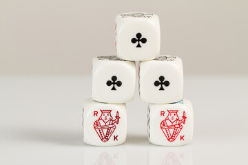 Full House, Aces and Kings Playing Casino poker dice closeup Isolated on white background with reflection. Abstract Pattern