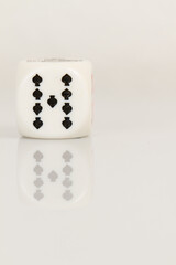 Nine Playing Casino poker dice closeup Isolated on white background with reflection. Abstract Pattern