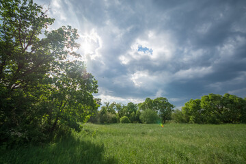 Fototapeta na wymiar Sonne und Wolken Pegnitzgrund