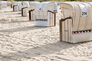 Empty sun chairs on the Baltic Sea beach. Grossenbrode, Schleswig- Holstein, Germany