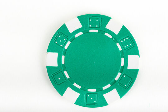 Green playing poker chip isolated on white background.