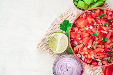 Tomato Salad mixed with red onion Mexican food homemade authentic style made from fresh healthy organic ingredient for vegan appetizer