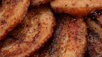 bacon. fried bacon rotation close up